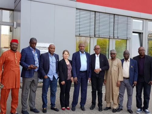 Anagu consulting with Nigerian Senators after a seminar